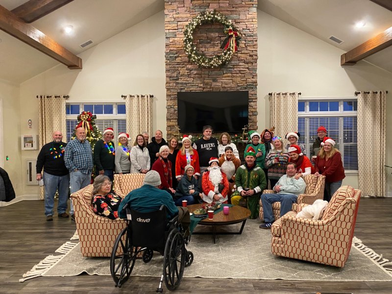 Woodfield Preserve community members gathered after the parade for refreshments and holiday fun. Shown are in back (l-r) Ken Heydt, HOA treasurer; Larry Siedman, HOA president; Ed Gangi; Gwen Gangi; Pat and Glenn Barry; Frank and Sue Golden; Rick and Maryann Berlau; Jill Fitzcharles; Peter Hanuluk; Merrill Siedman; and Ken Kolb. In the third row are Jeanene McCune; Zena Burkett; Donna Hanuluk, event chair; Cyndi Bilous; Heather Beckett; and Laura Kolb. In the second row are Carolyn Wood, Tami Heilemann, Gary Burkett and David Burkett. In front are Peggy Johns and David Johns (camera shy). SUBMITTED PHOTOS